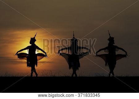 The Black Silhouette Of The Three Manohra Actors Dancing. Manohra Performance Is A Folk Dance That H