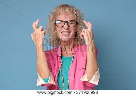 Beautiful Senior Woman Making A Sincere, Honorable Promise Or Oath