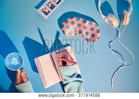Healthy Night Sleep Creative Concept In Pink And Blue. Sleep Mask, Pink With Green Polka Dots, White