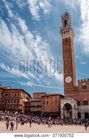 Siena Tuscany, Italy, April, 2018: Public Palace, Palazzo Pubblico In Campo Square, Piazza Del Campo