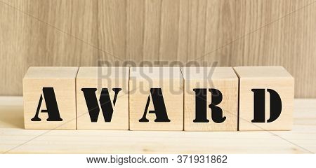 Awards Word Written On Wood Block. Awards Text On Wooden Table For Your Desing, Concept.