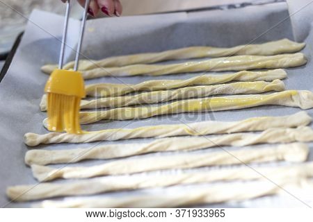 Home Made Snacks Of Breaded Rolls On Table