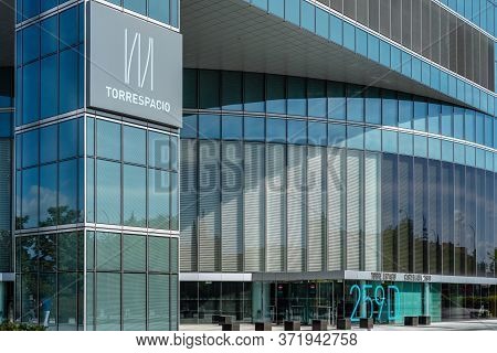 Madrid, Spain - June 14, 2020: Entrance To Office Building Skyscraper In Four Towers Business Area. 
