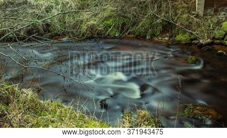 Dark River Fluffy Water, Rocky Road In Natural Park
