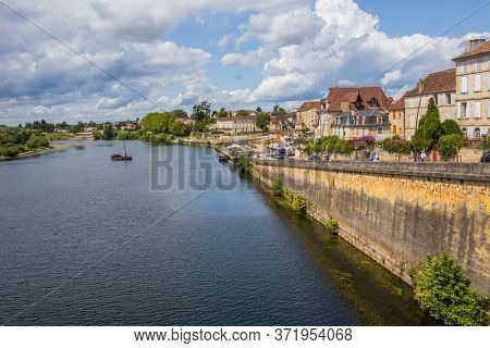 BERGERAC, FRANCE - AUGUST 12, 2019: Dordogne Riverfront in Bergerac. The town has an important tourist industry.