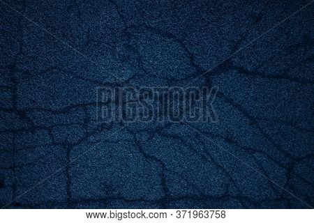 Dark Stone Wall Texture With Shadows And Cracs