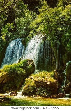 Kravice Waterfall On The Trebizat River In Bosnia And Herzegovina In Autumn. Miracle Of Nature In Bo