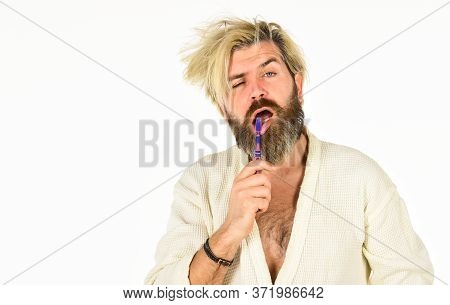Feeling Sleepy In Bathroom. Man In Bathrobe Brush His Teeth. Good Morning. Male Health Care And Pers