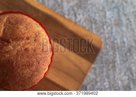 Homemade Wheat Cliced Bread On Wooden Cutting Board On Burlap Background. Bake Pies At Home