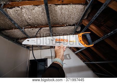 Paris, France - Mar 10, 2020: Male Hand Holding Against Construction Site Background New Bahco Profc