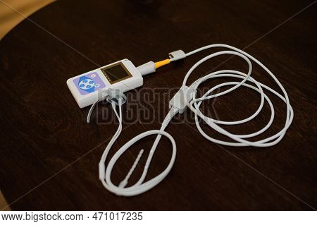 Man Using Pulse Oximeter Measures Oxygen Saturation Level, Health Care Monitoring Concept. Pulse Oxi