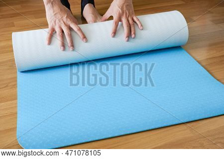 Blue Yoga Mat Roll Women She Exercise Yoga At The Swimming Pool