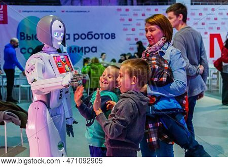 Exhibition Of Robots, Federal Tour Mts Robostations. Visitors With Children Interact With Exhibits. 