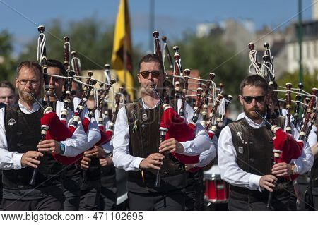 Quimper, France - July 24 2022: Musicians Of The Bagad Cap Caval From Plomeur During The Cornouaille