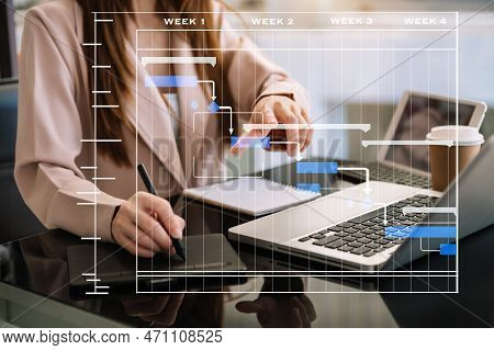 Project Manager Working And Update Tasks With Milestones Progress Planning And Gantt Chart Schedulin