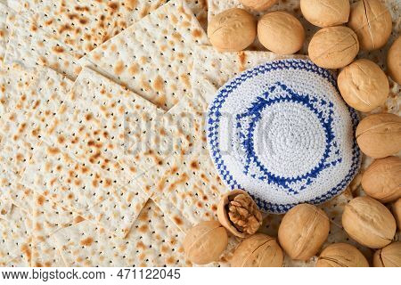 Passover Celebration Concept. White Kippah With Star Of David On Matzah Texture Background. Passover