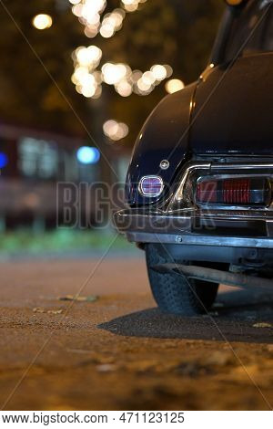 Black French Classic Car Parked In Front Of Other Cars At Night In Duesseldorf, Germany