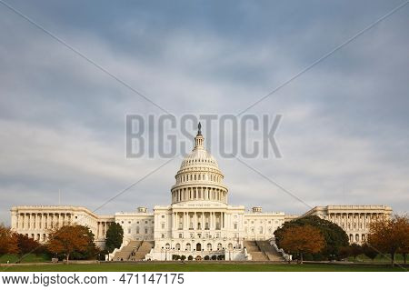 WASHINGTON, DC - November 12, 2007. United States Capitol Building at sunset in autumn, with blue sky and copy space. Capitol Hill, Washington DC