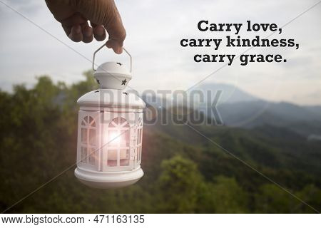 Life Inspirational And Motivational Quote - Carry Love, Carry Kindness, Carry Grace. With Person Hol