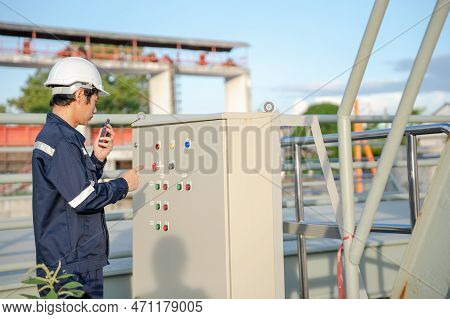 Mechanic Or Maintenance Or Electrical Engineer Checking Main Electrical Control Systems Industrial P