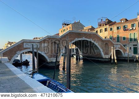 Bridge Over Canal In Sestiere Of Cannaregio In Venice City At Sunset