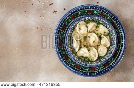 Chuchvara Dumplings With Meat. Delicious Uzbek Dumplings. Manti With Lamb Meat. Uzbek Cuisine, Place