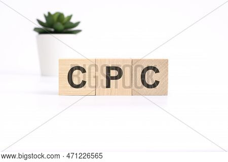 Cpc - Cost Per Click - Acronym On Wooden Cubes On White Background. Business Concept