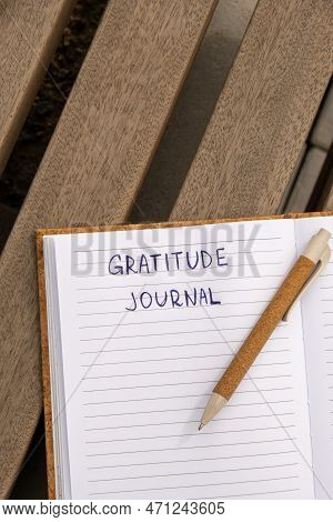 Writing Gratitude Journal On Wooden Bench. Today I Am Grateful For. Self Discovery Journal, Self Ref