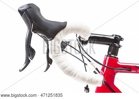 Sport Cycling Concepts. Road Bike Handlebars With White Tape Placed With Wheel Against White Backgro