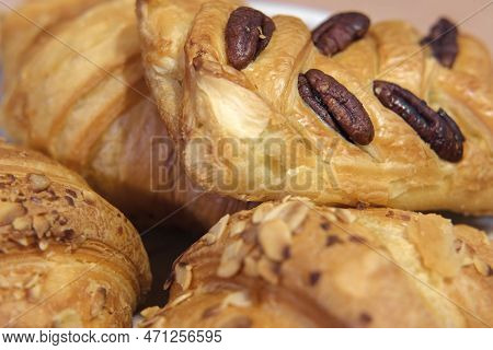French Puff Pastry And Croissant With Toppings. Freshly Baked Sweet Buns Couple Flaky Pastry With Al