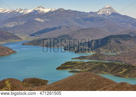 Mountain And Blue Lake Landscape. Village Of Riano. Spain, Europe