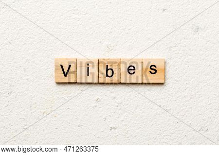 Vibes Word Written On Wood Block. Vibes Text On Table, Concept