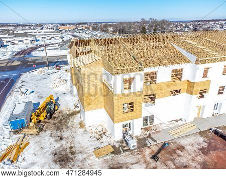 Aerial Drone View Of A Multifamily Apartment Complex Under Construction.