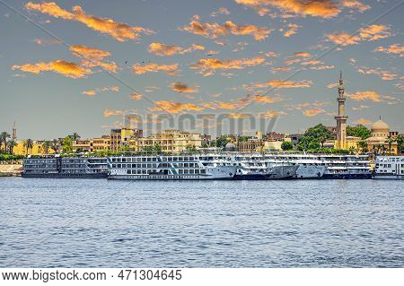 Luxor, Egypt - April 24, 2022: Tourist Cruise Ships On The Nile River, Anchored In The Tourist Port.