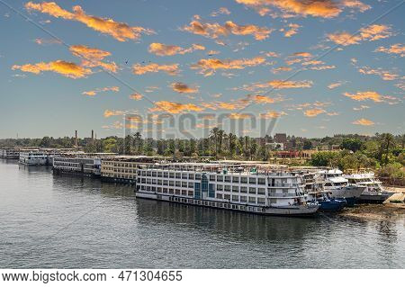 Luxor, Egypt - April 24, 2022: Tourist Cruise Ships On The Nile River, Anchored In The Tourist Port.