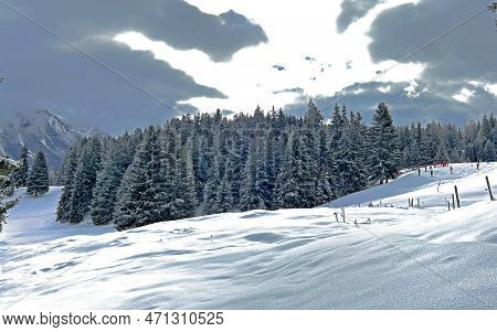 Beautiful Low Winter Clouds And Fog Condensation In The Swiss Alps Above The Tourist Resorts Of Valb