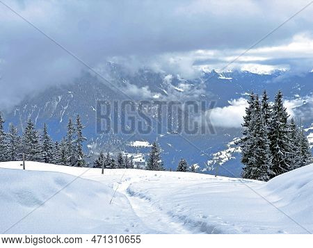 Beautiful Low Winter Clouds And Fog Condensation In The Swiss Alps Above The Tourist Resorts Of Valb
