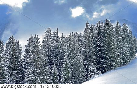 Beautiful Low Winter Clouds And Fog Condensation In The Swiss Alps Above The Tourist Resorts Of Valb