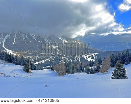 Beautiful Low Winter Clouds And Fog Condensation In The Swiss Alps Above The Tourist Resorts Of Valb