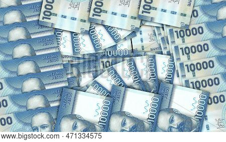Chile Pesos Banknotes In A Cash Fan Mosaic Pattern. Chilean 10000 Clp Notes. Abstract Concept Of Ban