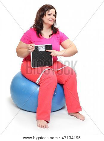 Gorda com máquina de pesagem.