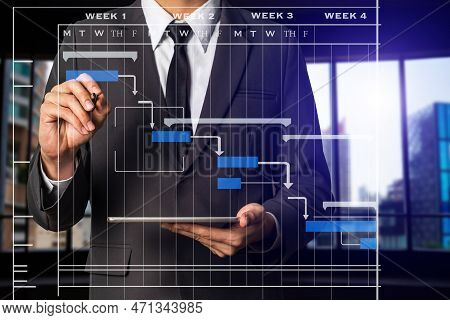 Project Manager Working And Update Tasks With Milestones Progress Planning And Gantt Chart Schedulin
