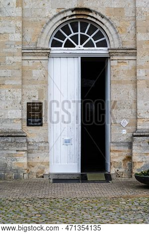 Kessel-lo, Flemish Brabant, Belgium - Feb 11 2023 - White Entrance Door Of The Vlierbeek Abbey