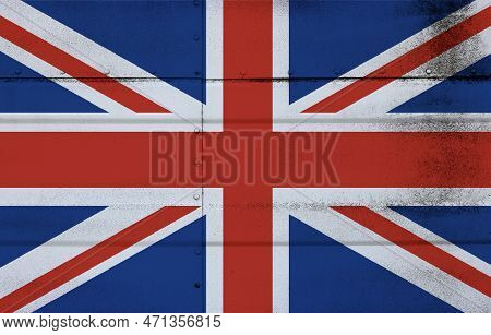 Grunge Weathered National Flag Of Great Britain Over Studded Steel Armor Metal Surface Background, S