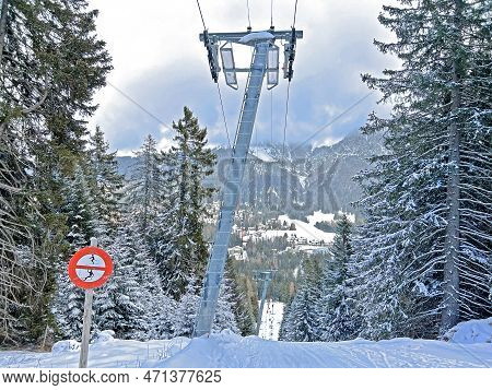 T-bar Ski Lift (schlepplift Mit T-bügel-anker) On The Snowy Slopes Of The Swiss Alpine Winter Resort