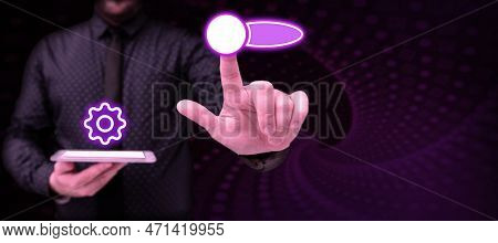 Human In Office Suit Holding Mobile Phone And Pressing On Virtual Button With Finger. Futuristic Ima