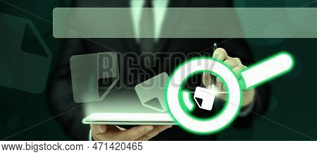 Businessman In Office Suit Holding Tablet And Pen. Written Virtual Text On Screen. Futuristic Image 
