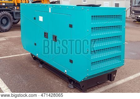 Emergency Aux Electric Power Generator Outside At Parking Lot