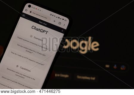 Warsaw Poland - February 24, 2023: Openai Chatgpt Vs Google Concept. Chat Bot Gpt On Smartphone And 