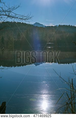 Reflection At Lake Tuettensee On A Sunny Winter Day